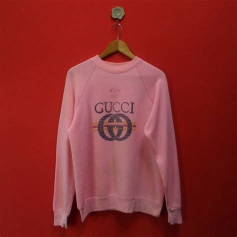 orange and blue gucci sweater|pink Gucci sweatshirt.